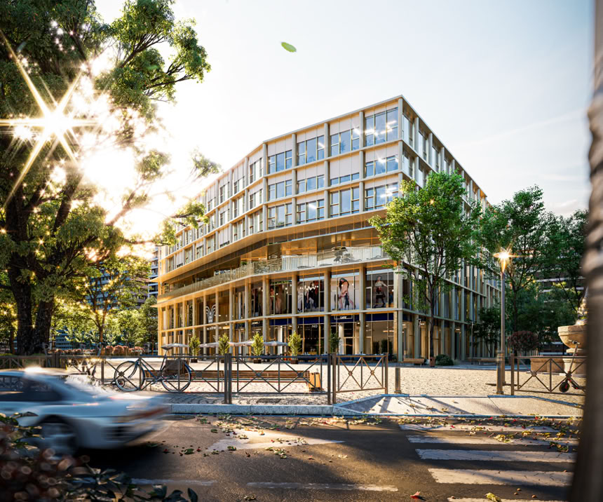 Modernes Gebäude mit Glasfassade, umgeben von Bäumen, bei Sonnenuntergang.